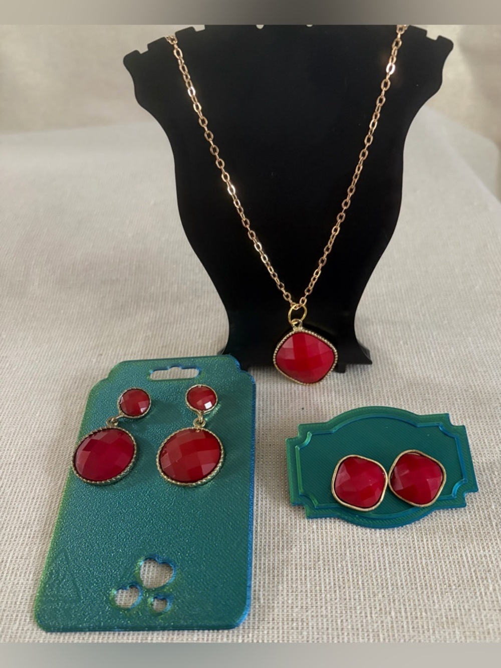 Gold-Tone Necklace and Earring Set with Red Faceted Stones